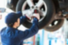 Mechanic Fixing Car