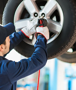 Mechanic Fixing Car