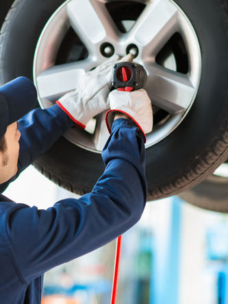 Mechanic Fixing Car