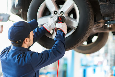 Mechanic Fixing Car