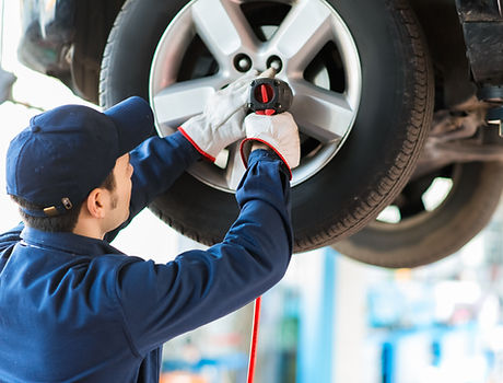 Mechanic Fixing Car
