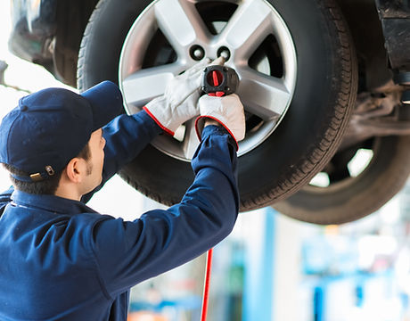 Mechanic Fixing Car