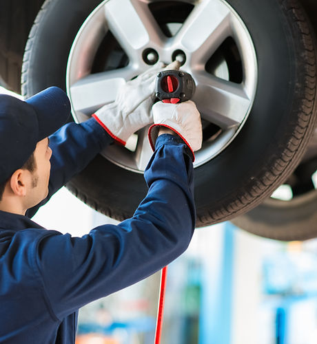 Mechanic Fixing Car