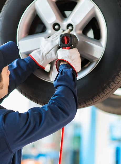 Mechanic Fixing Car