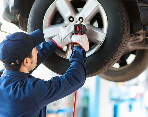 Mechanic Fixing Car