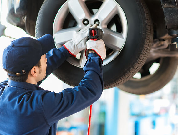 Mechanic Fixing Car