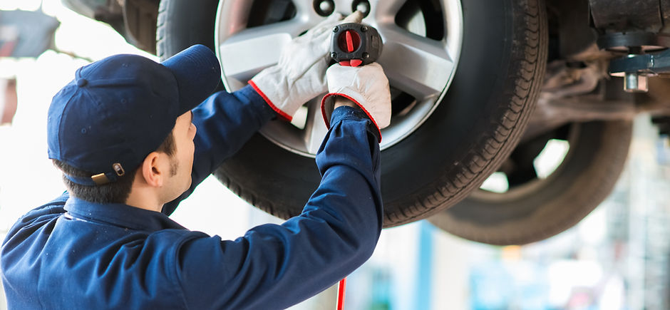 Mechanic Fixing Car
