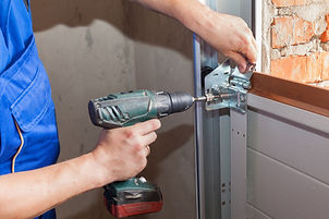 Garage Door drilling.jpeg