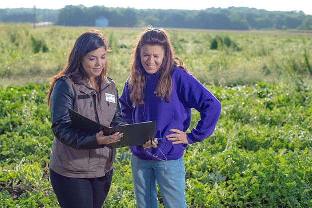 USDA FSA Staff Assist a Farmer On-Site, Image Credit: USDA FSA