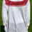 Thumbnail: White blouse with red embroidery.