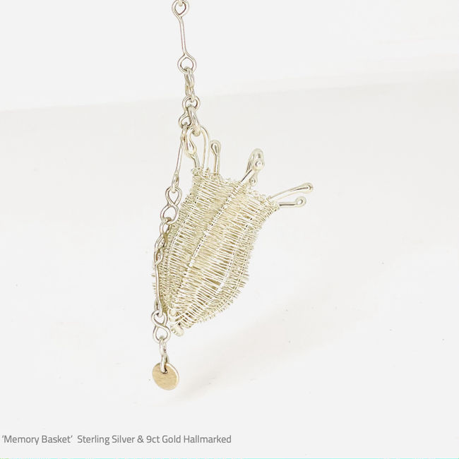 Fishing basket made of sterling silver and 9ct gold inspired by traditional fishing baskets from Sudan