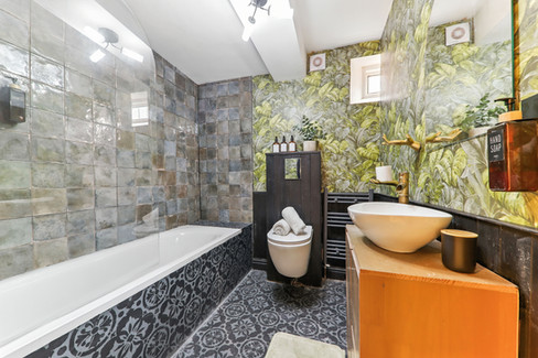 bathroom with colourful patterned tiles