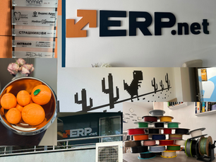 3D printing showcase featuring a colorful pyramid of filament spools, a 3D printed Main Street 3D logo visible from the street, branded oranges, a large office wall logo, and a redesigned entrance frame displaying all companies in the building