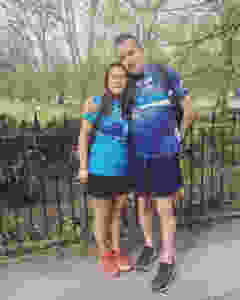 Father and daughter wearing half and full marathon t shirts