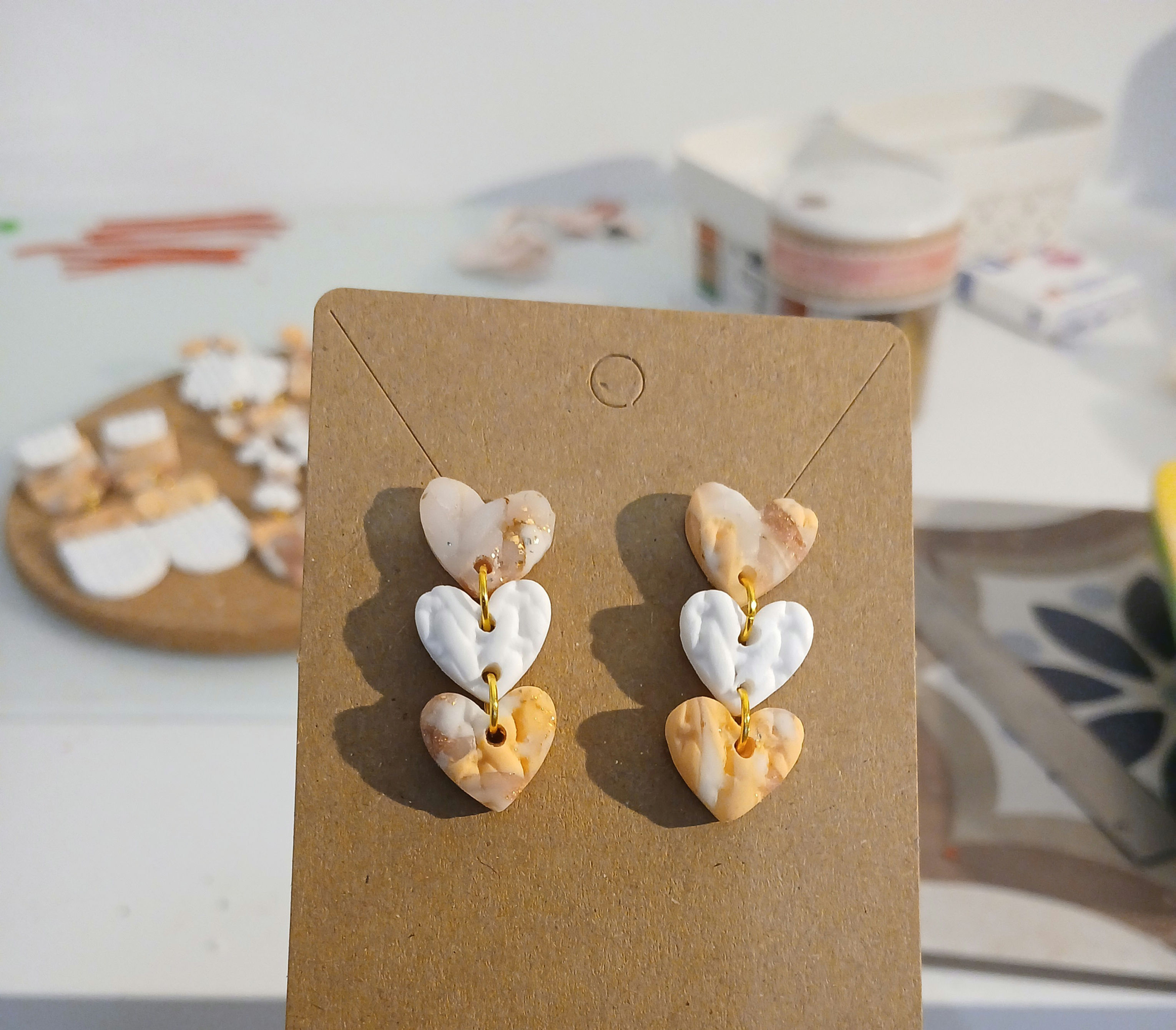 Boucles d'oreilles trio de coeur pêche 