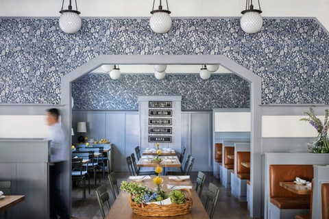 The dining room interior at Calistoga inn featuring Farrow and Ball wallpaper and paint colors