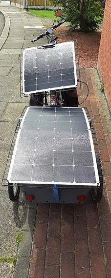 Twin solar panel set up for touring on an e-bike