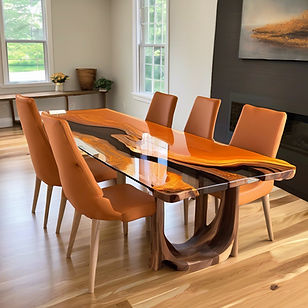 rectangular epoxy table with orange and gold epoxy between a wood setting like a river tab