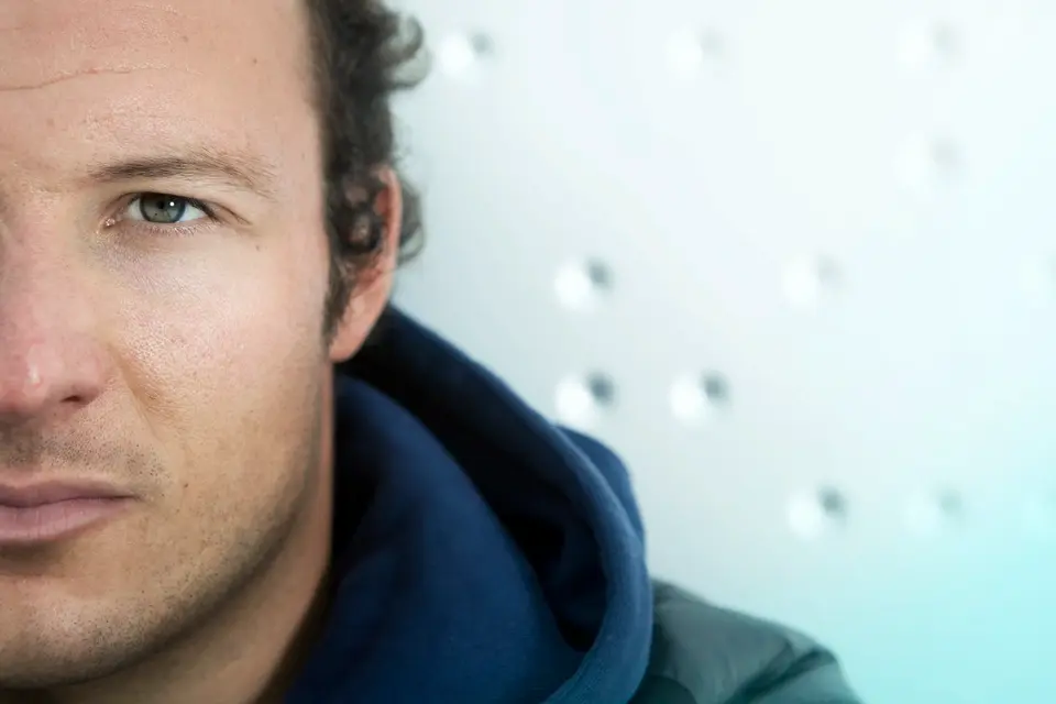 close up of half the face of Axel Lund Svindal, former ski alpinist, as he looks straight ahead.