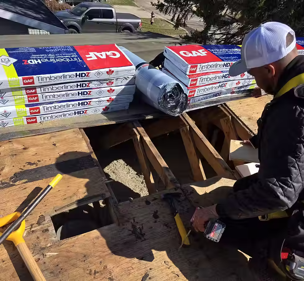 Roofer fixing broken roof