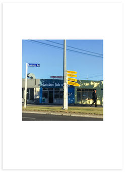 Glimpse of signs while traveling Awamoa Road, New Zealand.