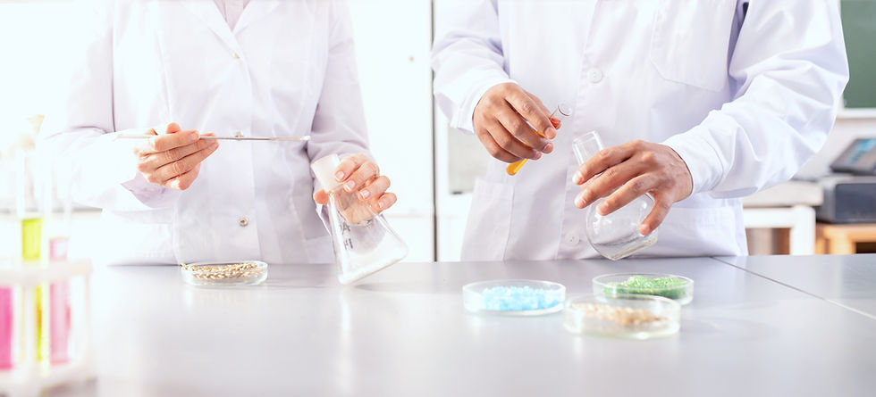 Two scientists at APRC conducting experiments