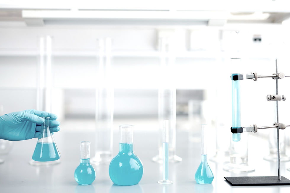 Blue liquid in science goblets