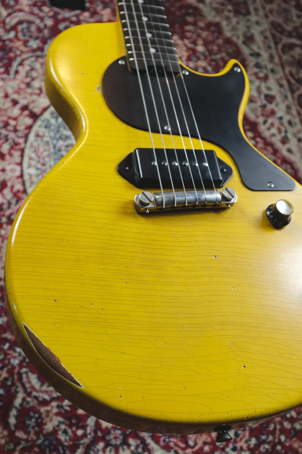 Thumbnail: Gordon Smith GS-1 Legacy Yellow Relic angled body shot ebony fretboard