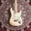 Thumbnail: "Birdseye view of Fender Standard Stratocaster Corona California 2010 on carpet