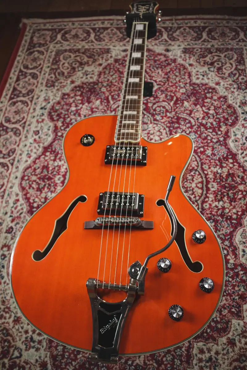 Thumbnail: Epiphone Swingster Bigsby style vibrato tailpiece detail