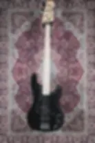 Squier Precision Bass PJ – full front view of bass with black body and maple neck