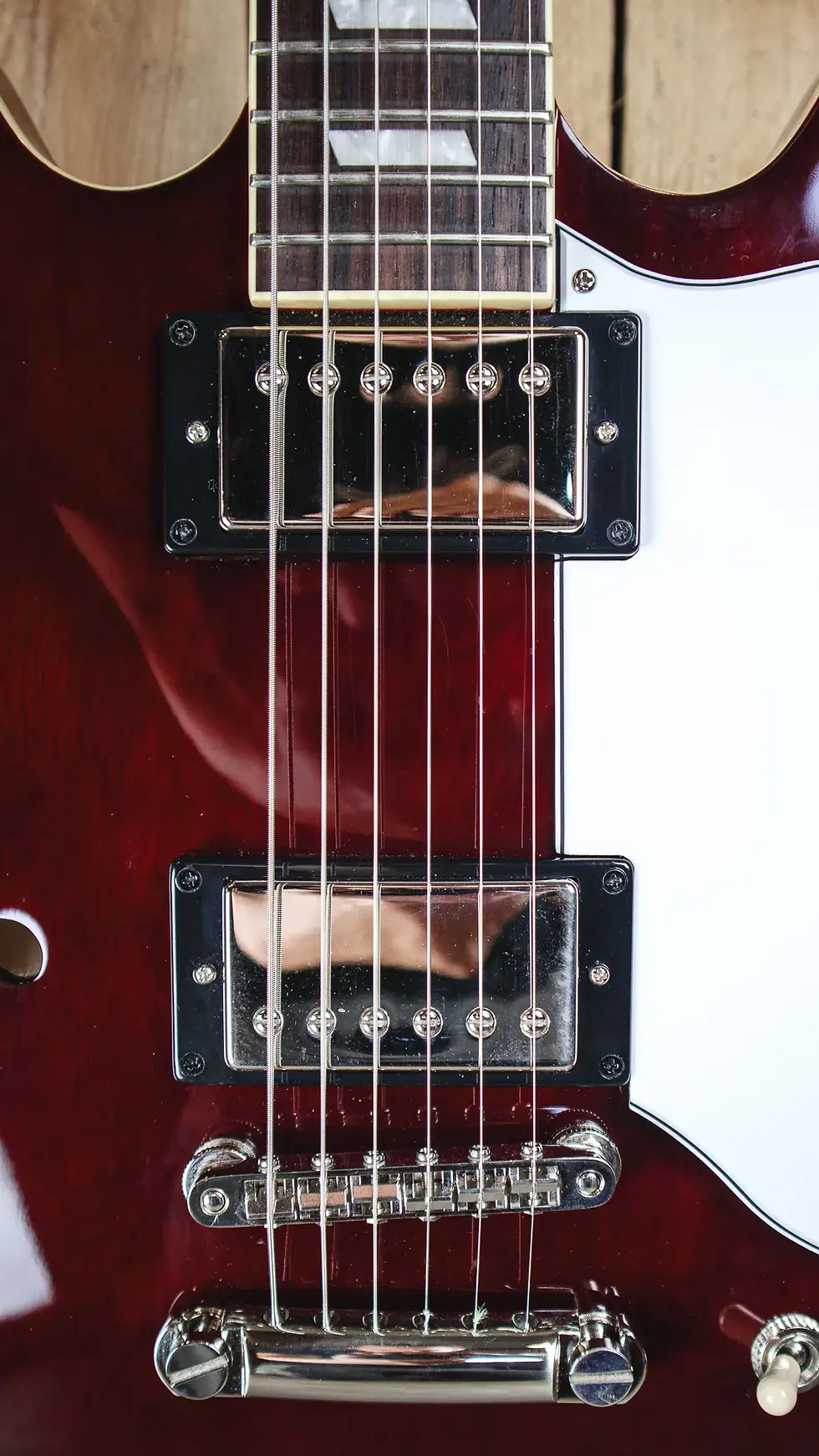 Thumbnail: Close-up of the 2022 Epiphone Riviera's humbucker pickups with chrome covers.