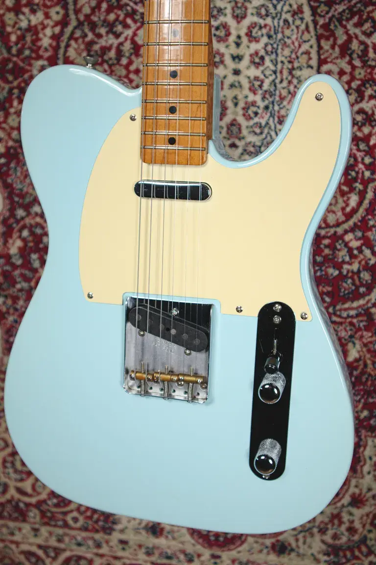 Thumbnail: Close-up of body showing bridge, pickup and pickguard on a Daphne Blue Fender Vintera ‘50s Telecaster