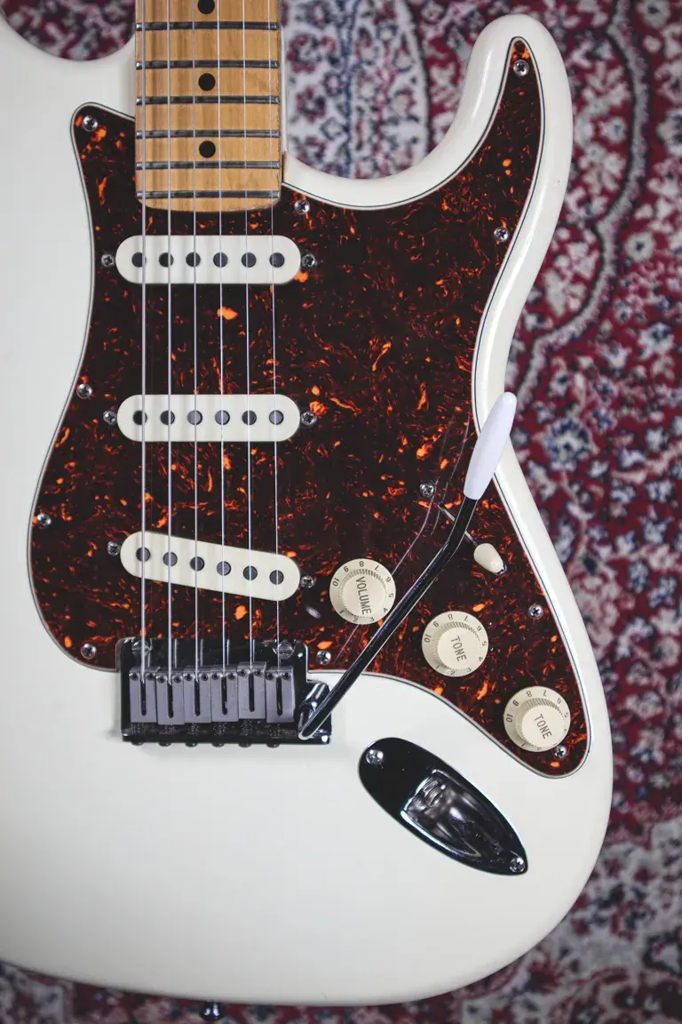 Thumbnail: Close-up of bridge, controls, and pickups on 1984 Fender Stratocaster
