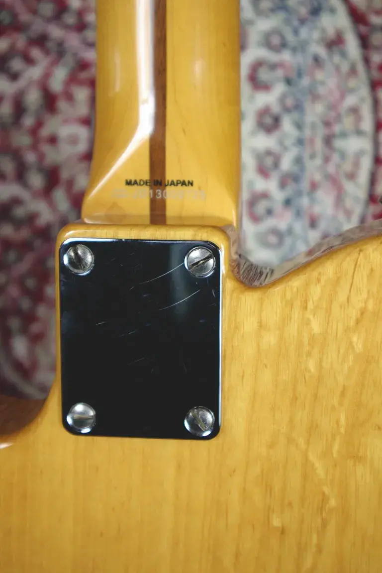 Thumbnail: Neck joint close-up showing “Made in Japan” stamp and neck plate on a 2013 Fender TL52 Telecaster.