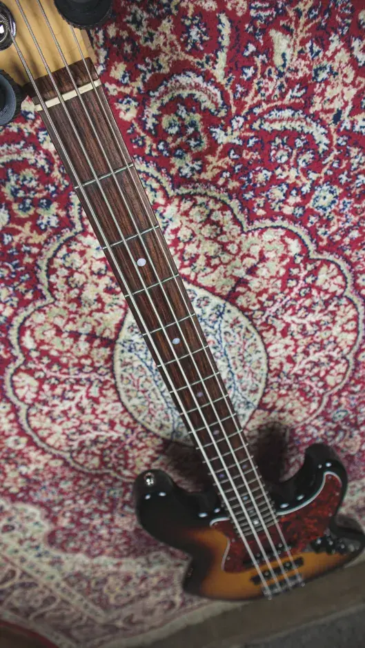 Thumbnail: Detailed view of the frets and neck on the Fender USA Jazz Bass 60th Anniversary Diamond Edition 2017 showcasing its craftsma
