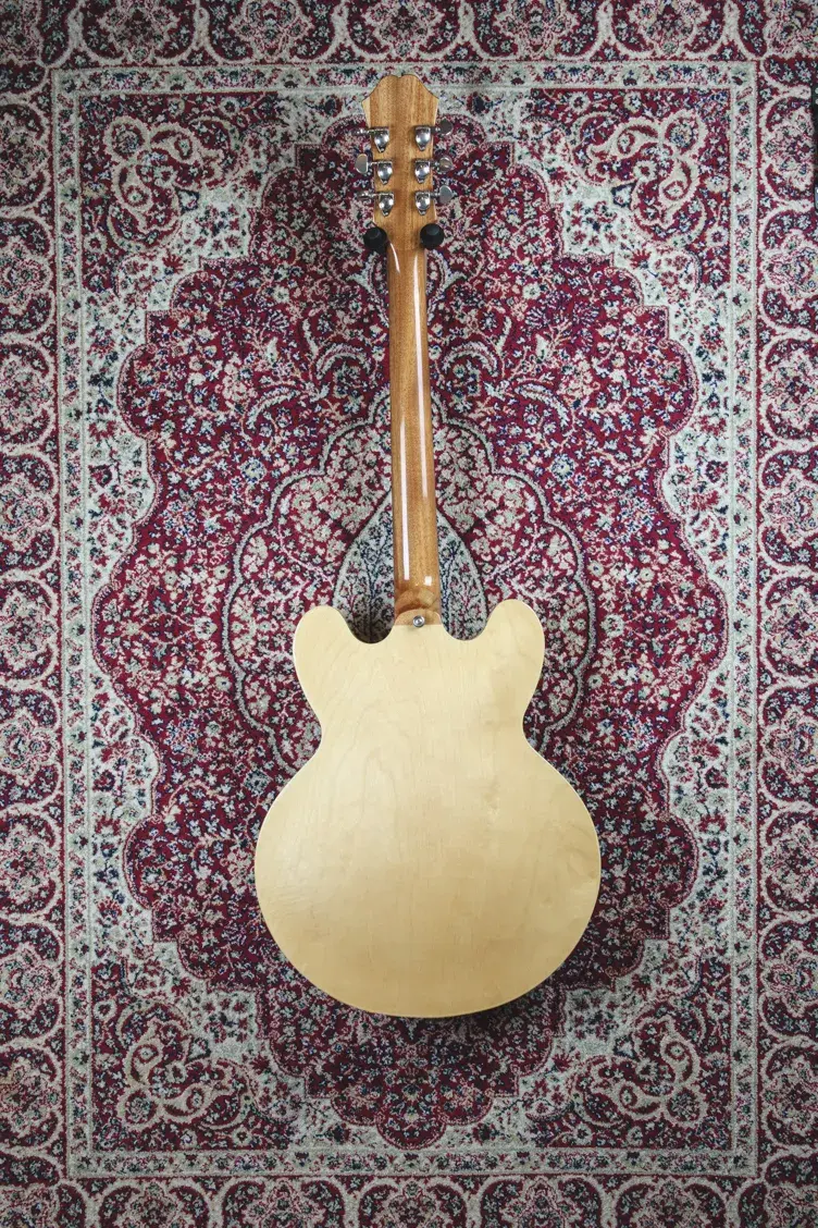 Back of Epiphone Dot 335 showcasing maple body and neck