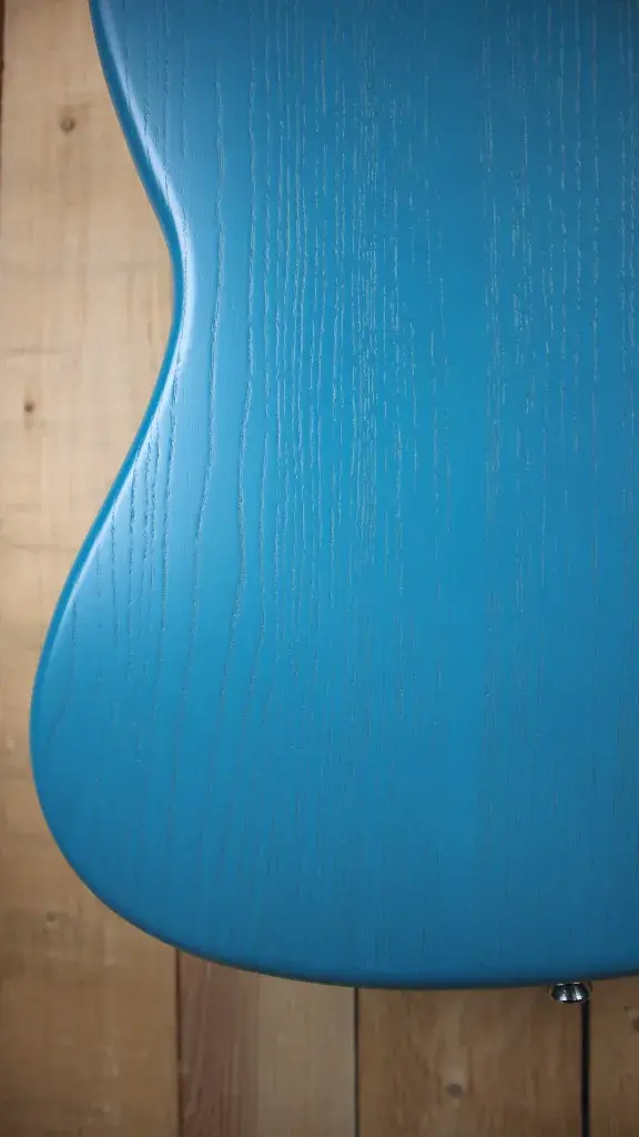 Thumbnail: Back view of the Marco Bass N1 Bass Guitar in Lau Blue, highlighting the neck and hardware.