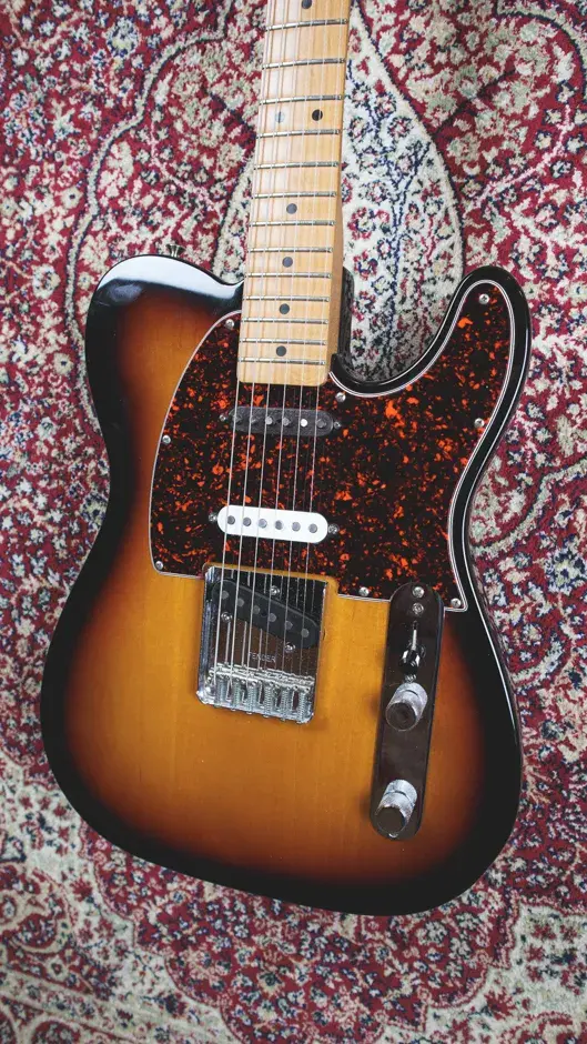 Thumbnail: Close-up of Fender Telecaster tortoiseshell pickguard and pickups