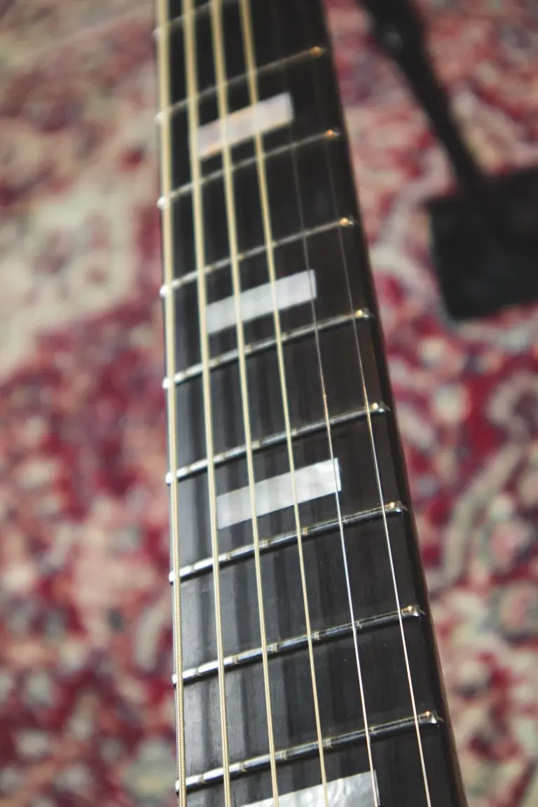 Thumbnail: Vintage Epiphone Texan neck and frets close up