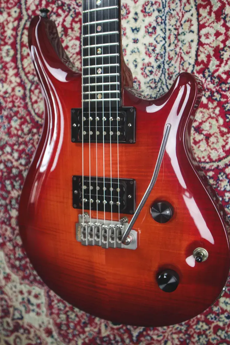 Thumbnail: Patrick Eggle Berlin Pro close-up of carved maple top in Cherry Sunburst