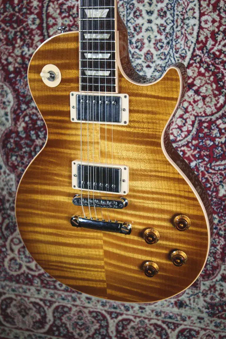Thumbnail: Close-up of flame maple top and pickups on 2016 Gibson Les Paul Standard T in Honeyburst