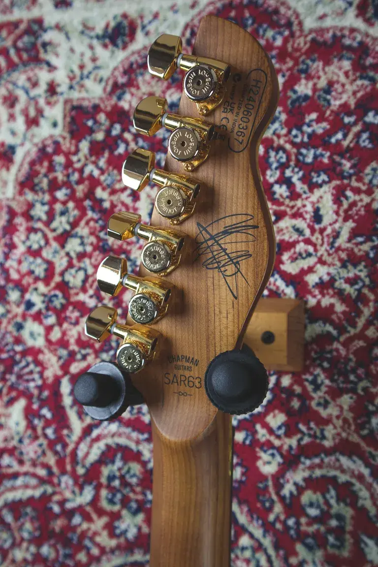 Thumbnail: Rear view of Chapman Chris Robertson Signature guitar headstock showing tuners, serial number, and artist signature