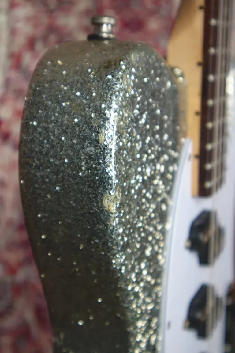 Thumbnail: Side edge of G&L ASAT Z-3 showing finish wear on silver sparkle body