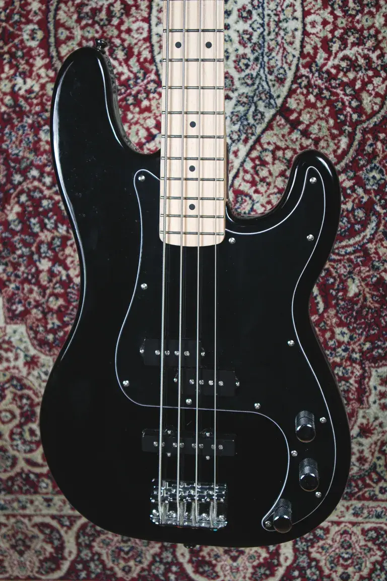 Thumbnail: Squier Precision Bass PJ in black – close-up of body, pickups and controls