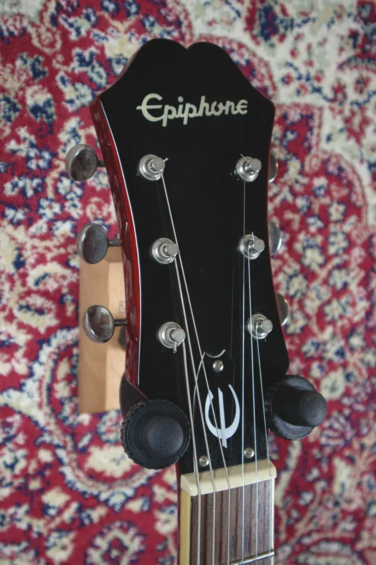 Thumbnail: Headstock close-up with Epiphone logo and tuners