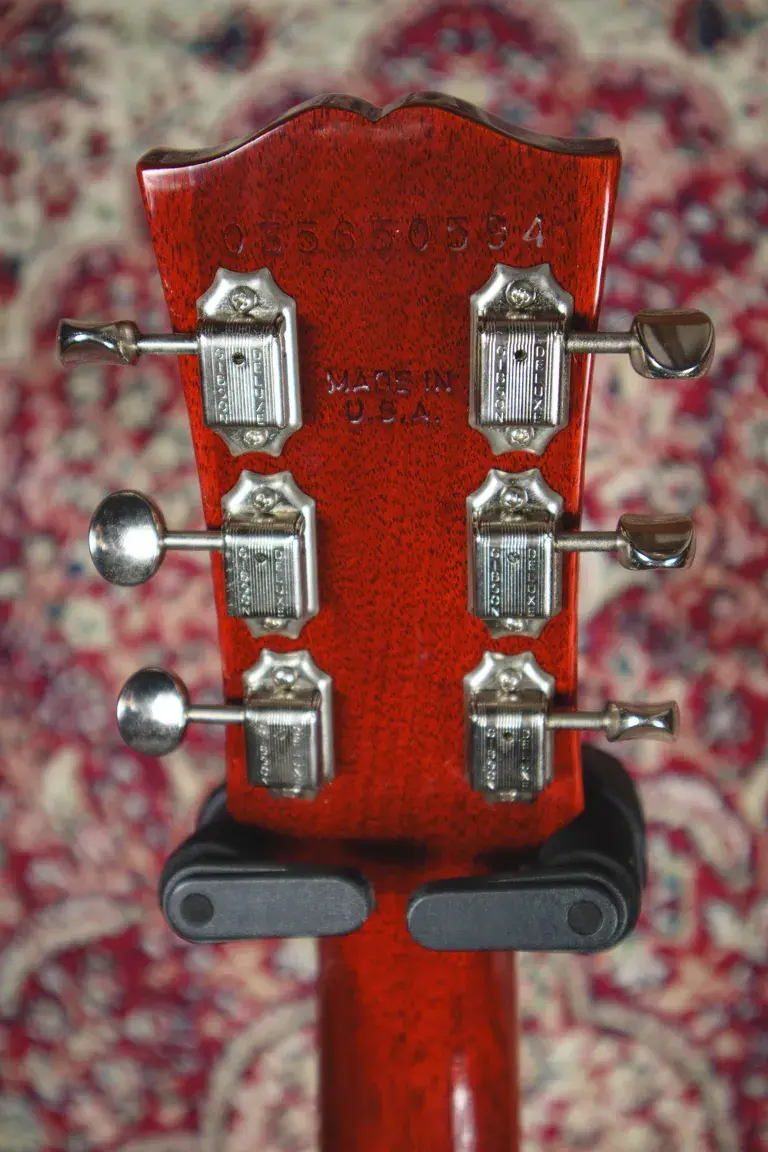 Thumbnail: Rear headstock close-up of a 2005 Gibson Les Paul Santa Fe showing serial number and vintage tuners.