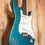 Thumbnail: Side view angle of the 2000 Fender American Standard Stratocaster in Lake Placid Blue