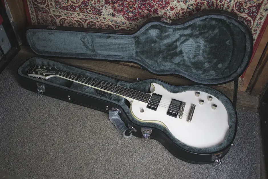 Thumbnail: The 2021 Epiphone Jerry Cantrell Les Paul Prophecy Custom displayed inside its Epiphone hard case.
