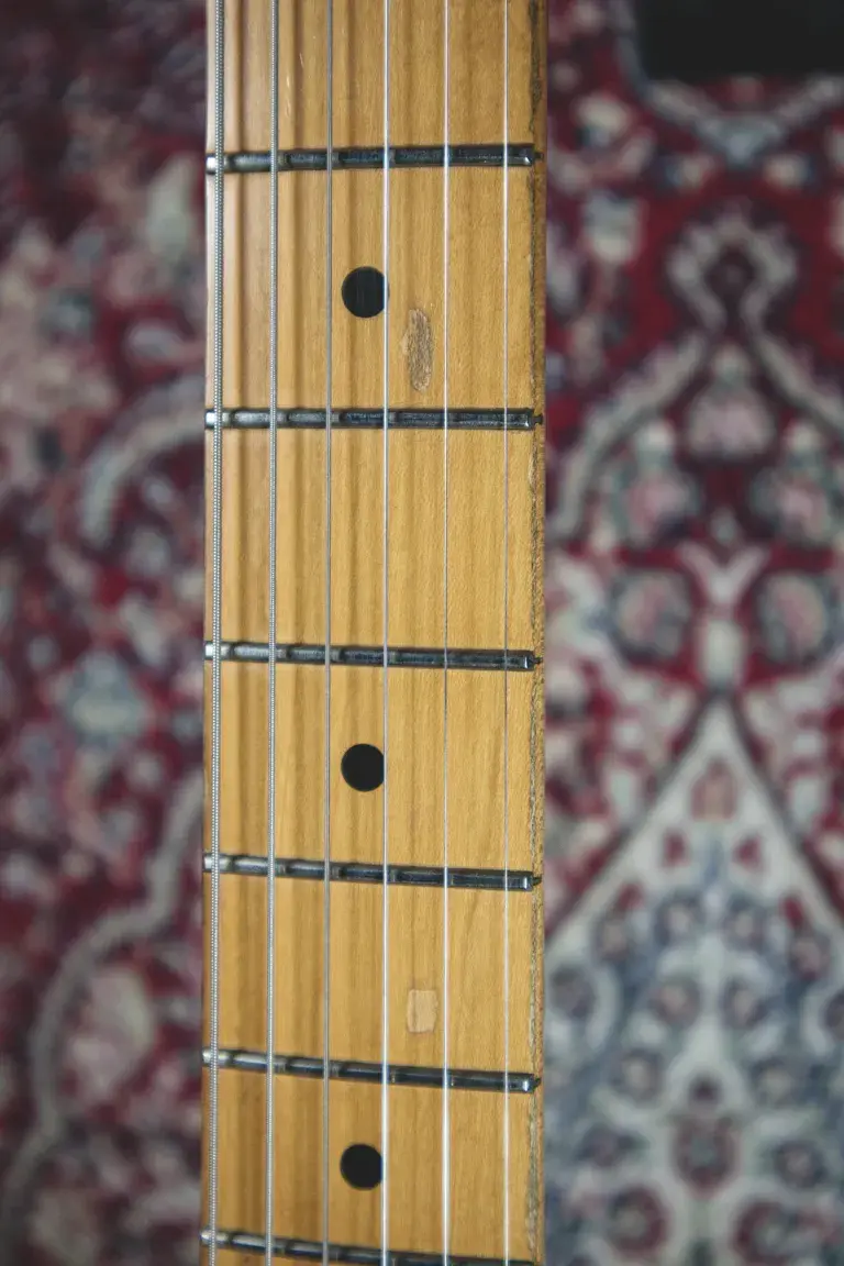 Thumbnail: Fender Stratocaster 1984 USA close-up of maple fretboard showing light playwear